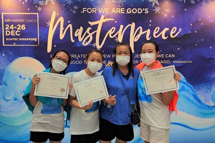 A mother witnessing her daughters’ baptism